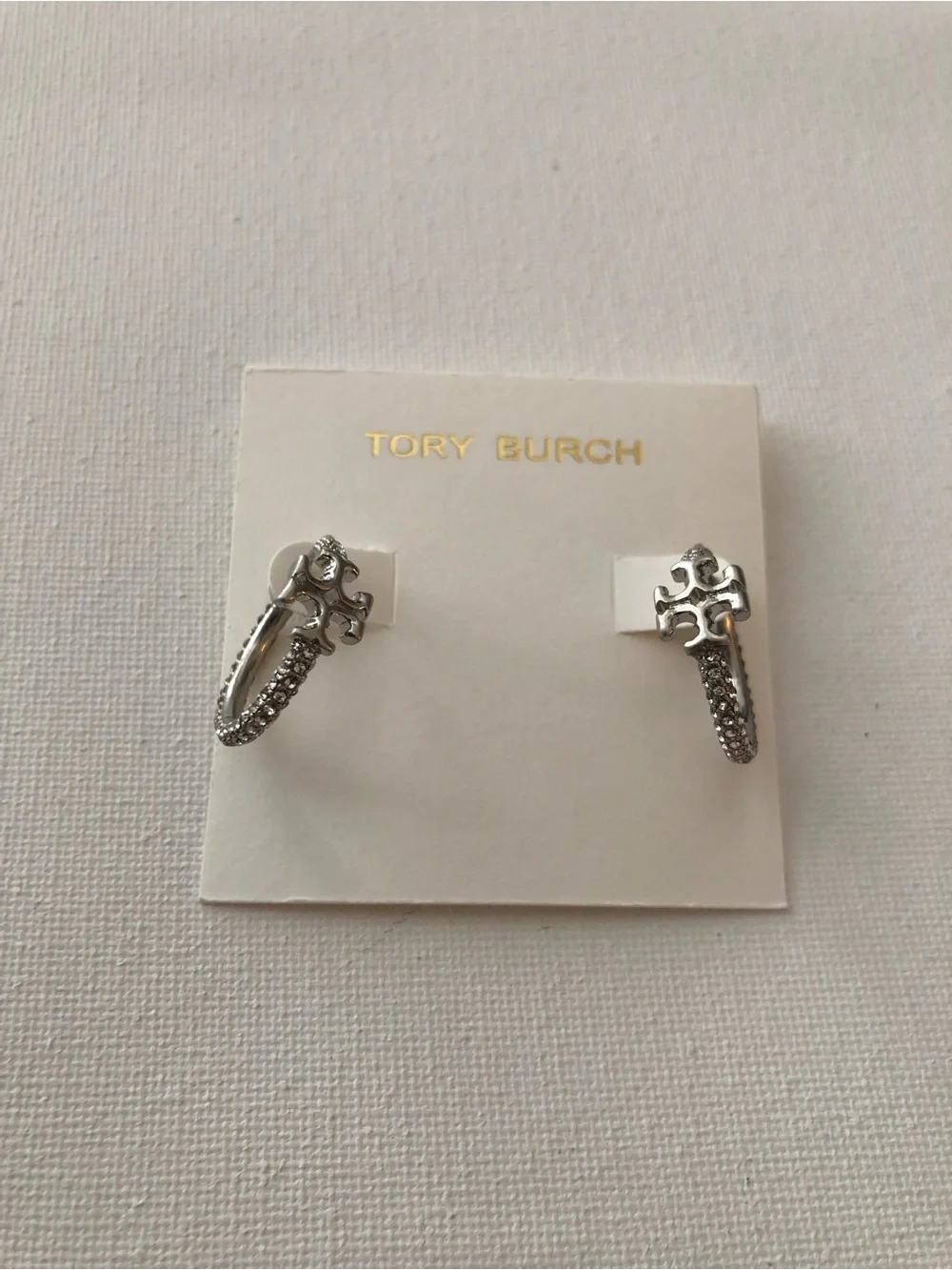 Tory Burch Silver Logo Crystal Huggie Earrings